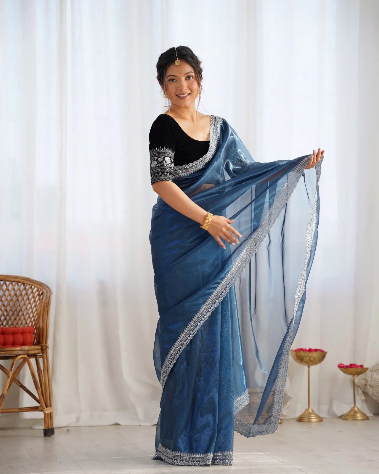 Beautiful light weight dola tussar silk sarees with all over temple design along with zari border (Blue)